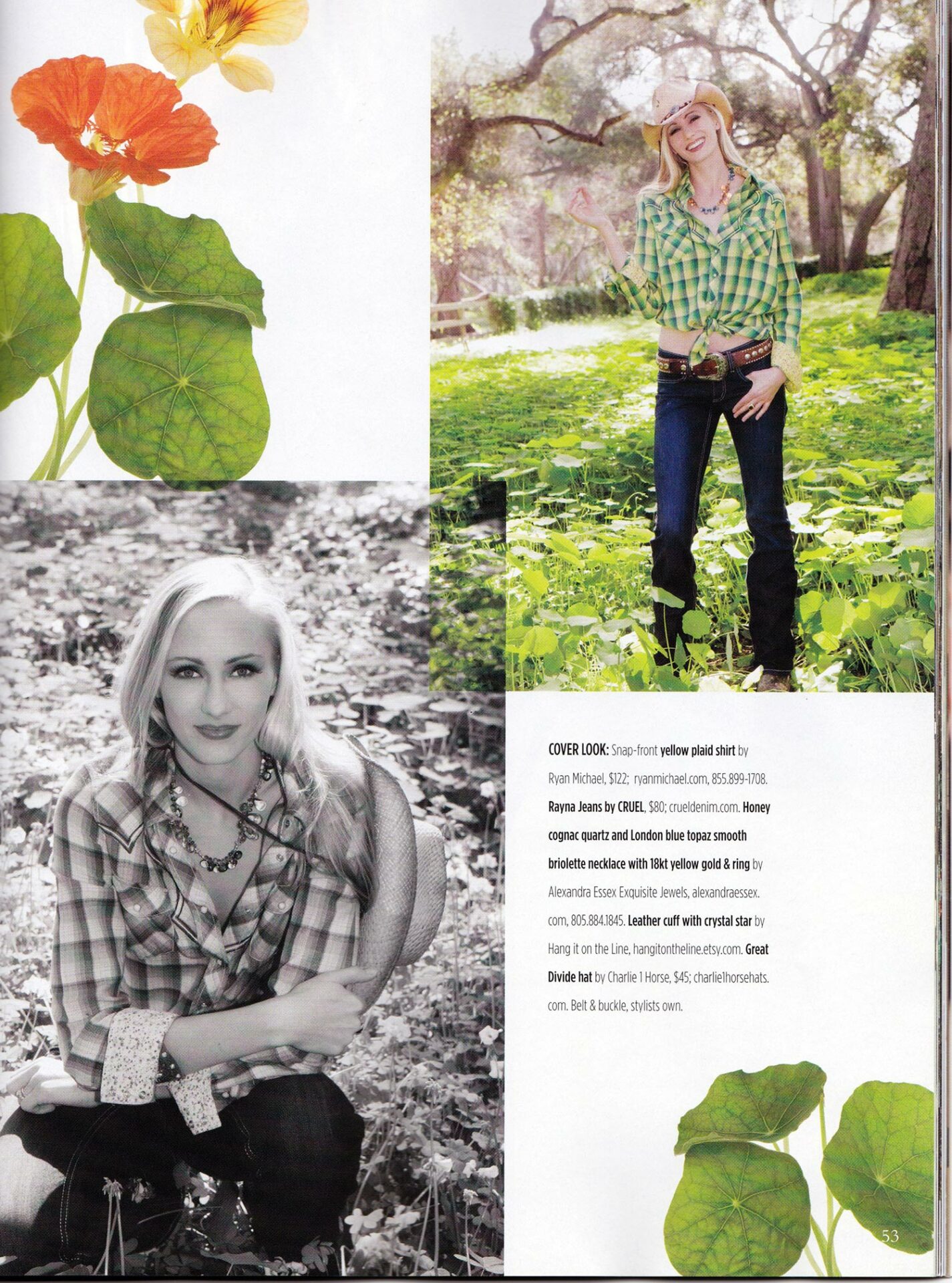 A woman in a plaid shirt is posing in front of a flower.